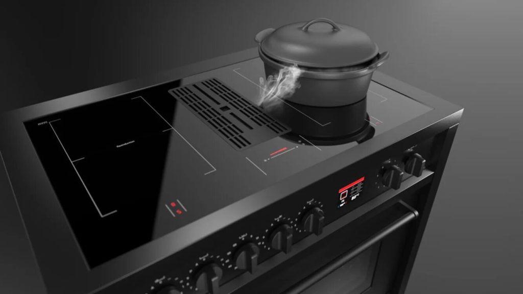 Imagen de la nueva cocina Enfasi mistral de la marca steel, de color negro siendo usada.